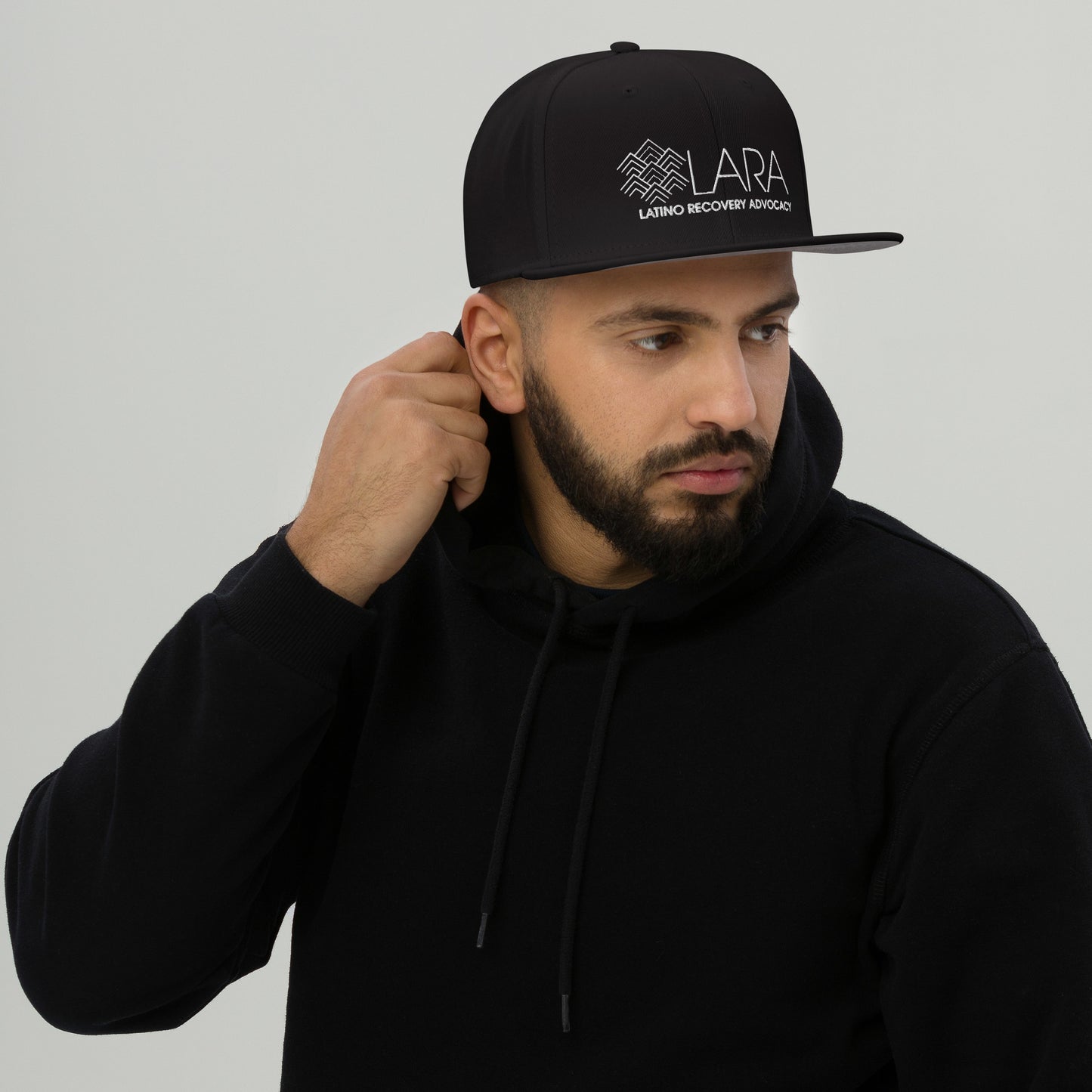 LARA White Logo Snapback Hat